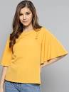 A cheerful and vibrant yellow top that's perfect for brightening up any outfit. It's a versatile piece that can be dressed up or down.